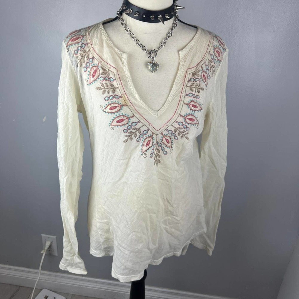 Boho white blouse has embroidered